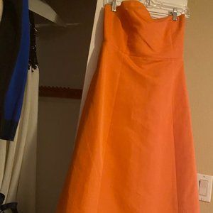 orange strapless mid length dress